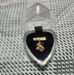 Gold-Tone Leaf Pendant with Pink Crystal